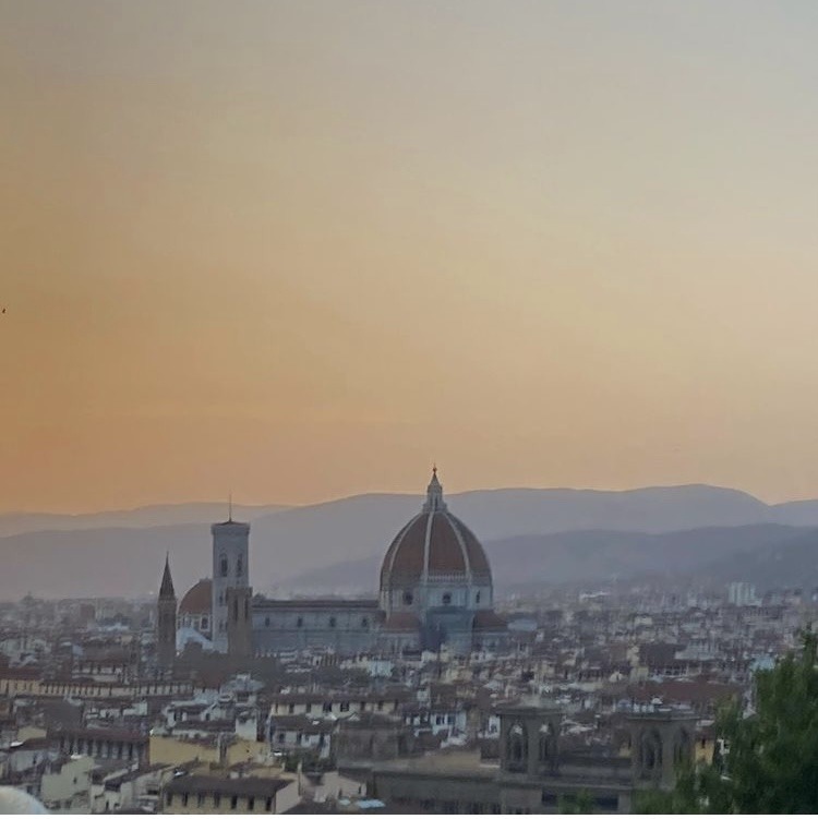 sunset over buildings in Florence