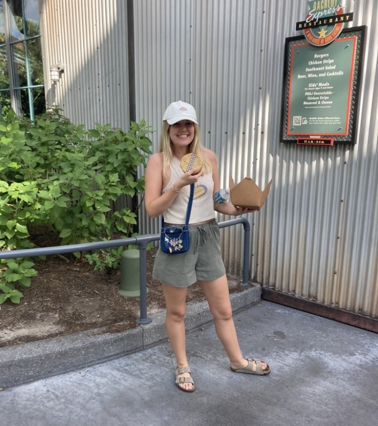 girl holding massive cookie