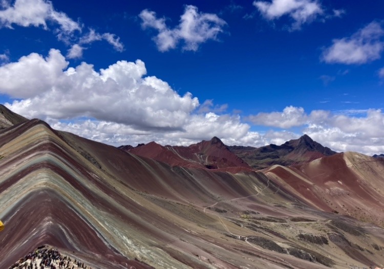 mountain striped with different colours