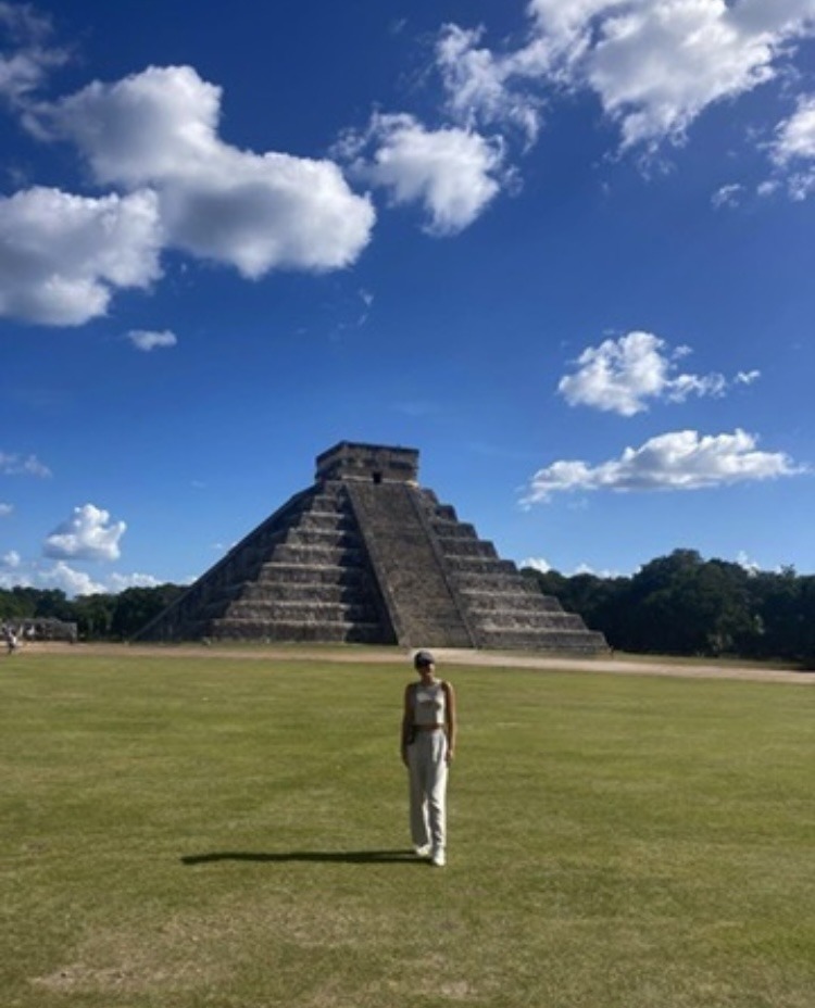 girl standing in front of temple