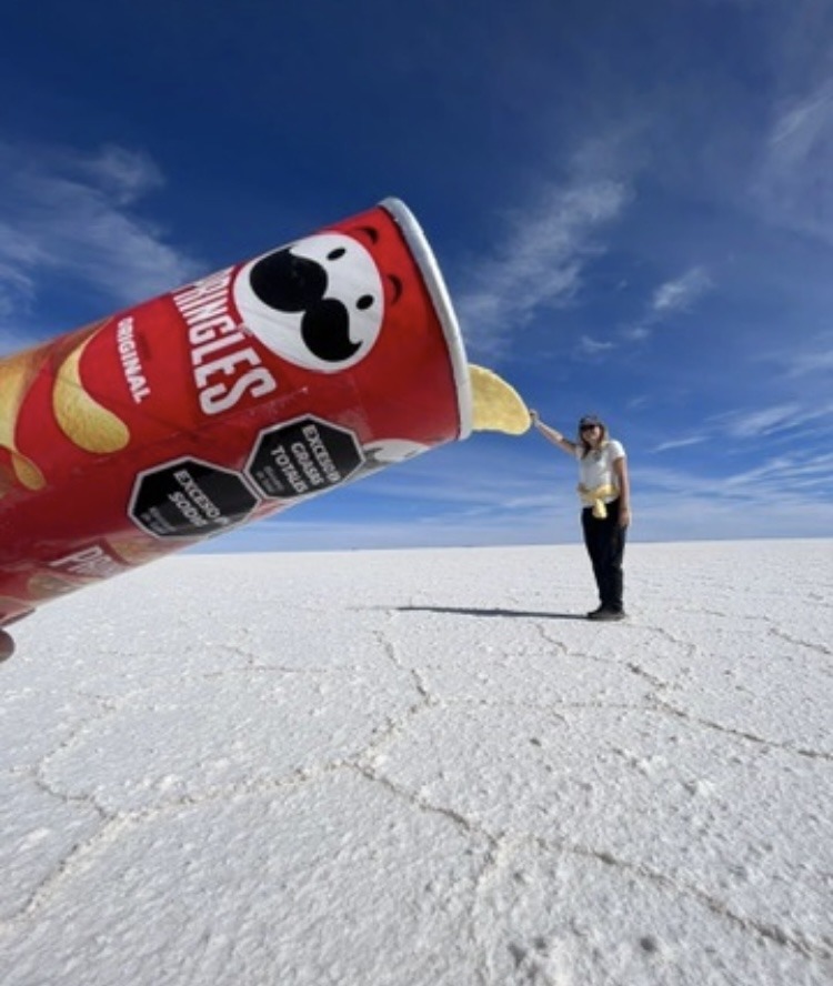 girl taking Pringle