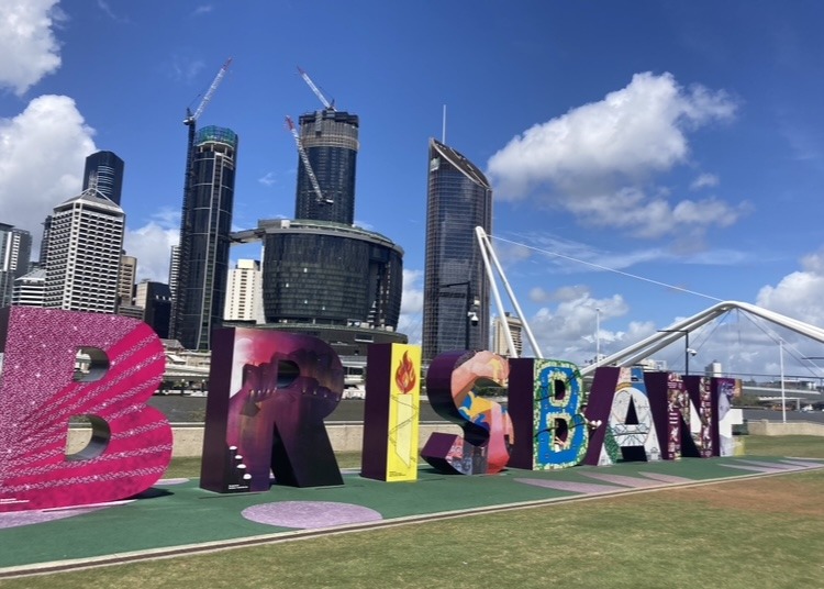 Brisbane sign in big letters on green grass