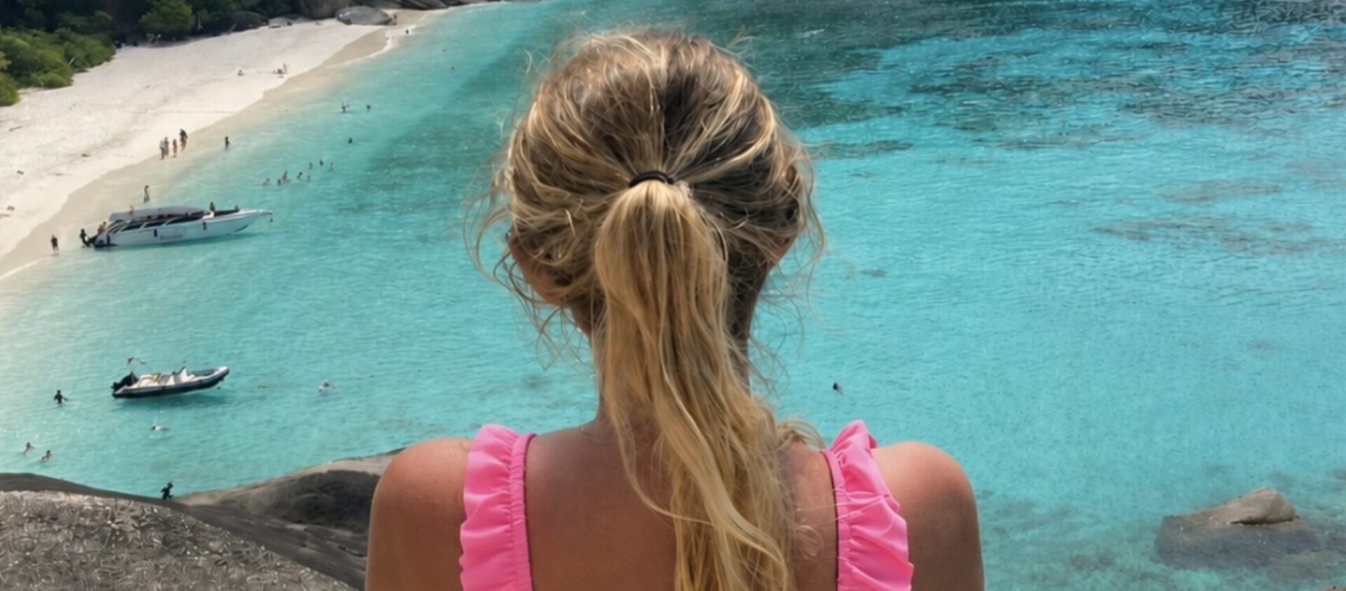 pink overlooking tropical beach